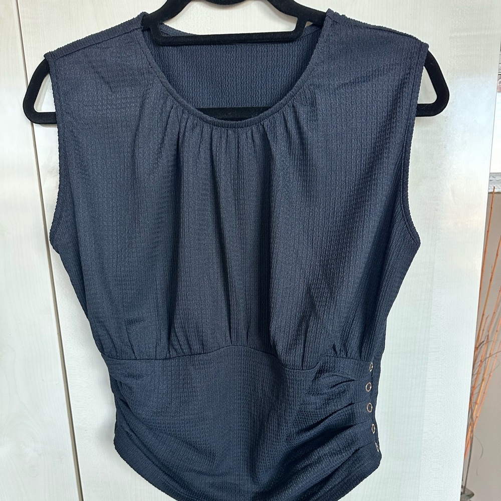 Casual or dressy Black Sleeveless Top
